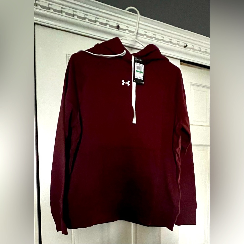 Woman’s Under Armour maroon hooded sweatshirt